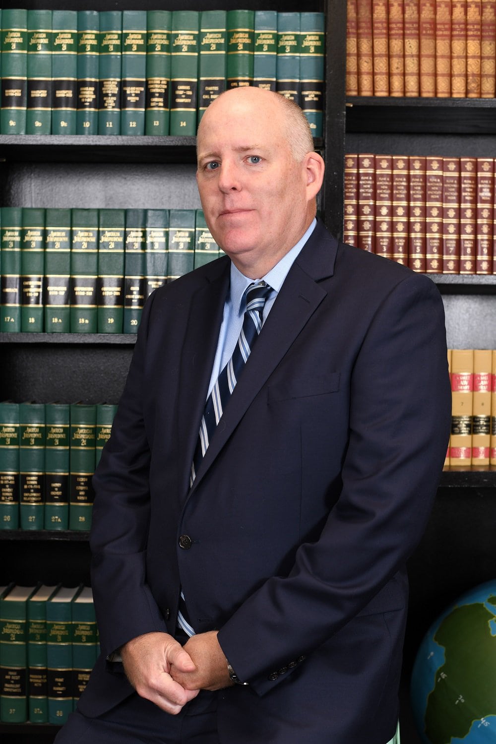 Portrait of a man representing R&G Personal Injury Lawyers, emphasizing the team's professionalism and expertise. The image is contextualized within the page by highlighting 'Our Attorneys,' providing a glimpse into the skilled legal professionals associated with the firm.