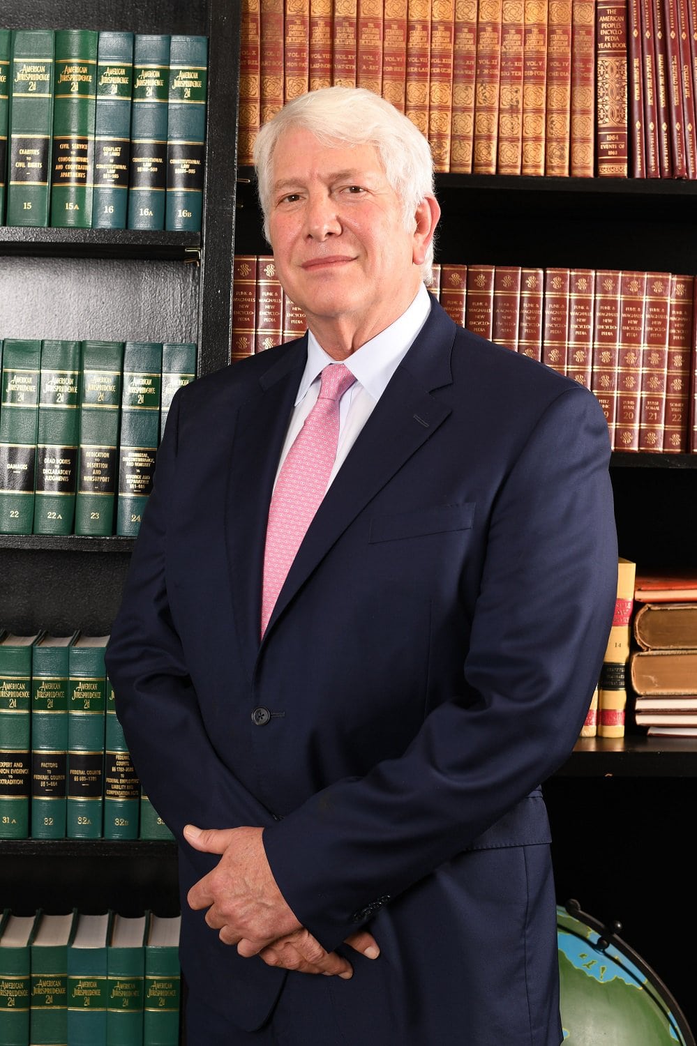 Portrait of a man representing R&G Personal Injury Lawyers, emphasizing the team's professionalism and expertise. The image is contextualized within the page by highlighting 'Our Attorneys,' providing a glimpse into the skilled legal professionals associated with the firm.